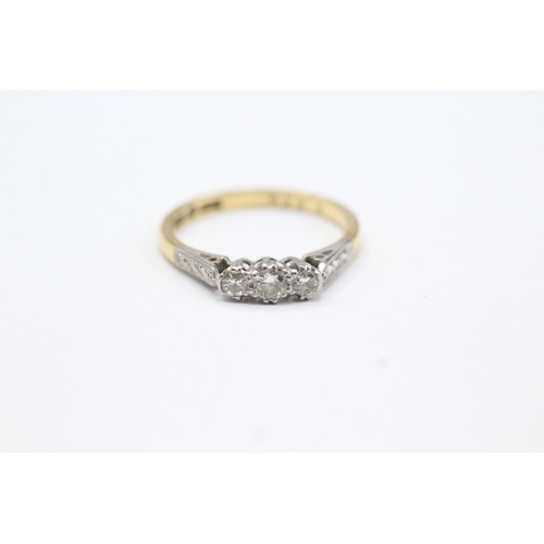 90 - 18ct gold diamond trilogy ring W/ diamond set shoulders (2.6g) Size M