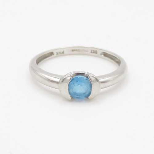 129 - 9ct white gold blue gemstone solitaire ring (2.2g) Size O