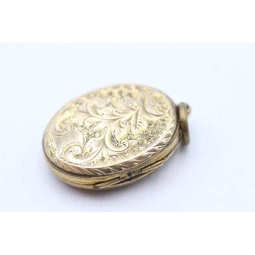 109 - 9ct gold back & front locket (7.6g)