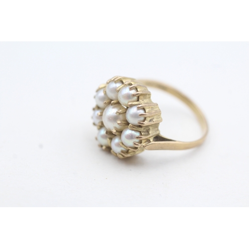 112 - 9ct gold cultured pearl cluster dress ring (4.1g) Size M