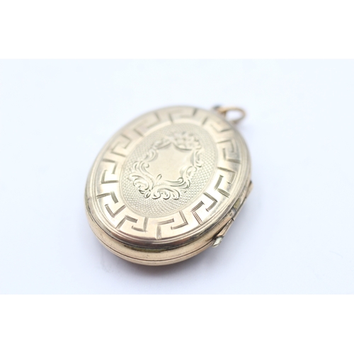 113 - 9ct gold back & front enamel locket (7.5g)