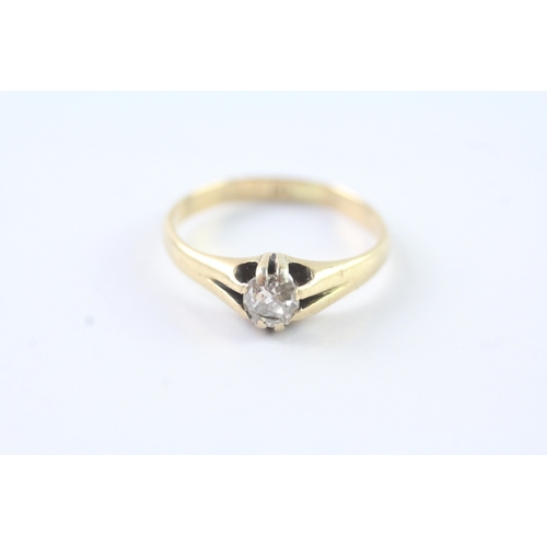 127 - 18ct gold diamond set solitaire ring (3.7g) Size Q 1/2