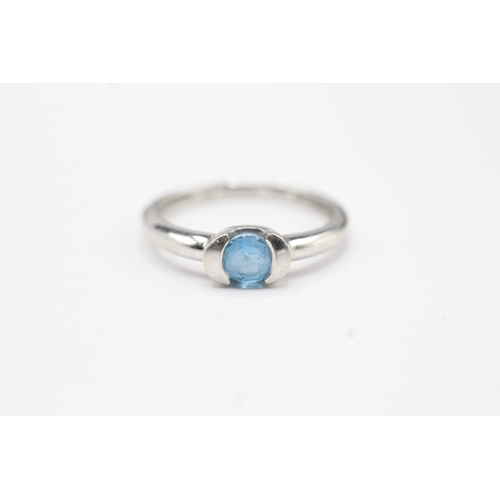 129 - 9ct white gold blue gemstone solitaire ring (2.2g) Size O