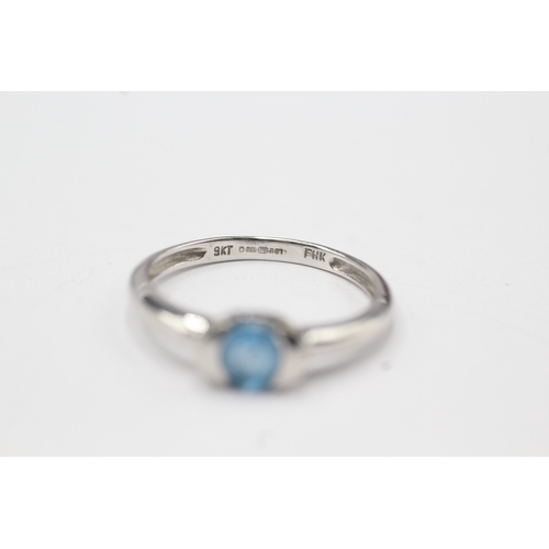 129 - 9ct white gold blue gemstone solitaire ring (2.2g) Size O