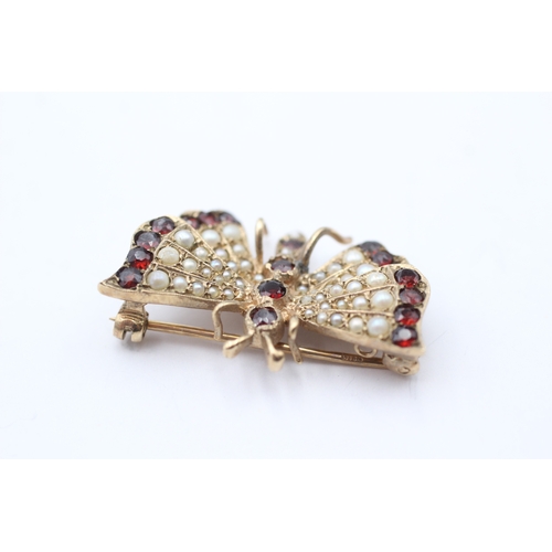 18 - 9ct gold vintage garnet & seed pearl butterfly brooch (7g)