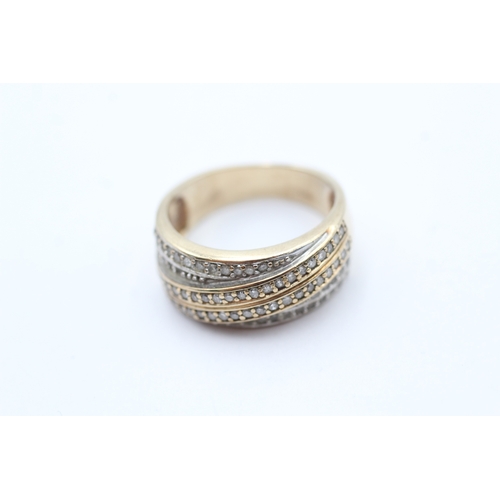 228 - 9ct gold diamond dress ring (5.7g) Size P