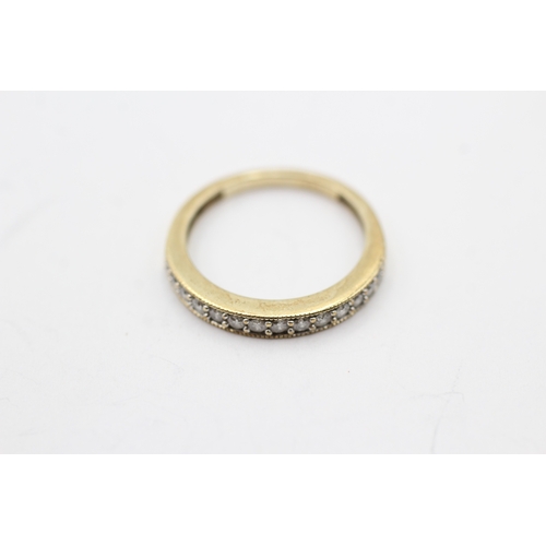 241 - 9ct gold diamond half eternity band (1.5g) Size I