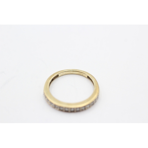 241 - 9ct gold diamond half eternity band (1.5g) Size I