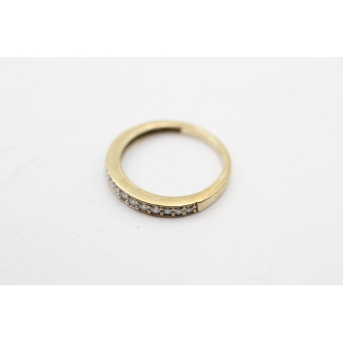 241 - 9ct gold diamond half eternity band (1.5g) Size I