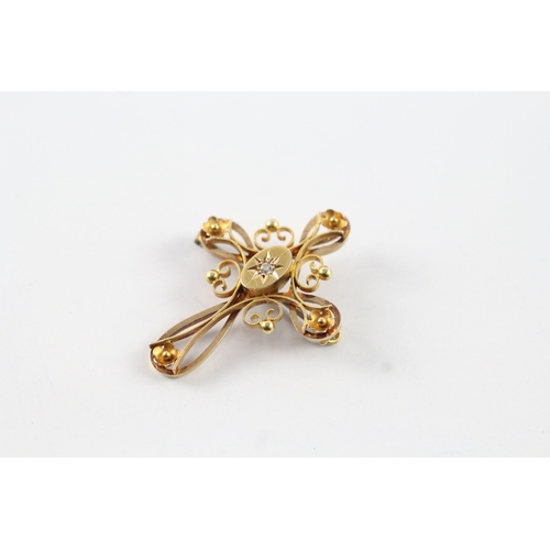 249 - 15ct gold antique star set diamond floral brooch (2.9g)