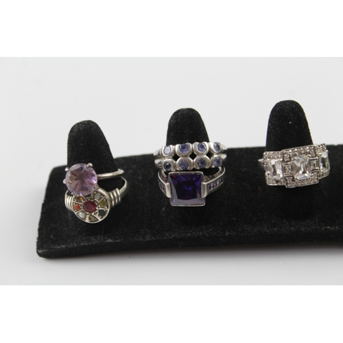 255 - Collection of Sterling Silver Gemstone Rings inc. Navaratna, Tanzanite x 10 46g