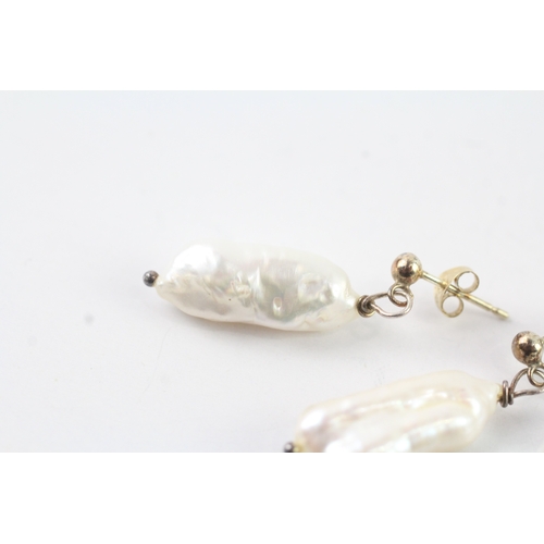 28 - 2 x 9ct gold baroque pearl and white gemstone drop stud earrings (6.5g)