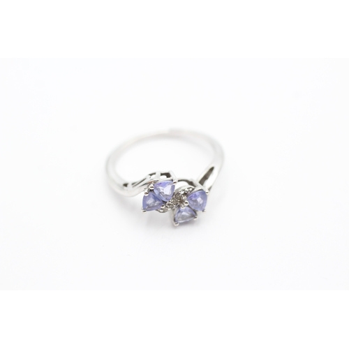 29 - 9ct gold tanzanite & white gemstone dress ring (2g) Size N 1/2