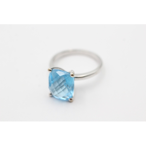 3 - 9ct white gold chequer cut blue topaz cocktail ring (5.2g) Size O 1/2