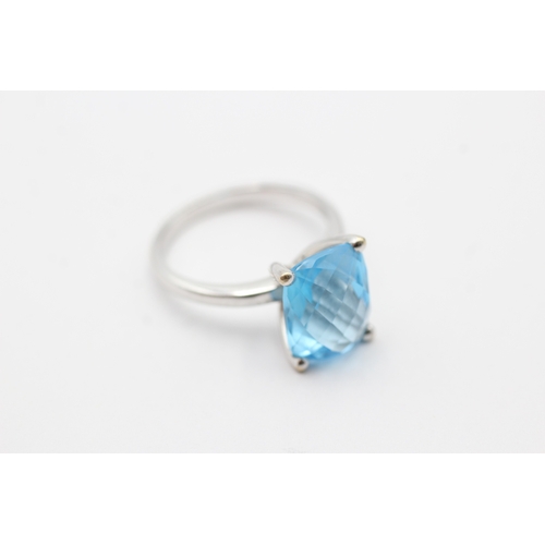 3 - 9ct white gold chequer cut blue topaz cocktail ring (5.2g) Size O 1/2