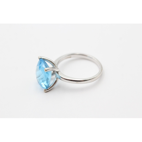 3 - 9ct white gold chequer cut blue topaz cocktail ring (5.2g) Size O 1/2