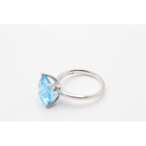 3 - 9ct white gold chequer cut blue topaz cocktail ring (5.2g) Size O 1/2