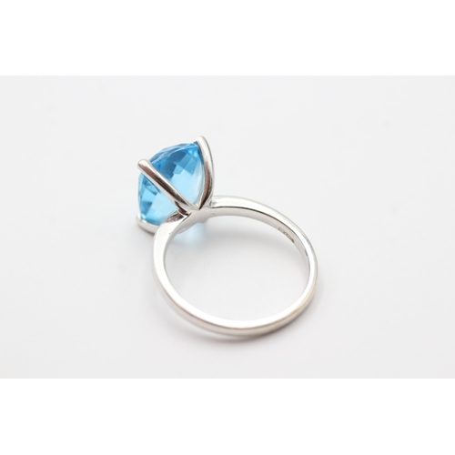 3 - 9ct white gold chequer cut blue topaz cocktail ring (5.2g) Size O 1/2