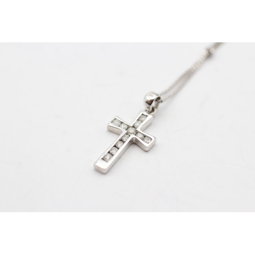 41 - 9ct white gold diamond cross pendant necklace (1.6g)