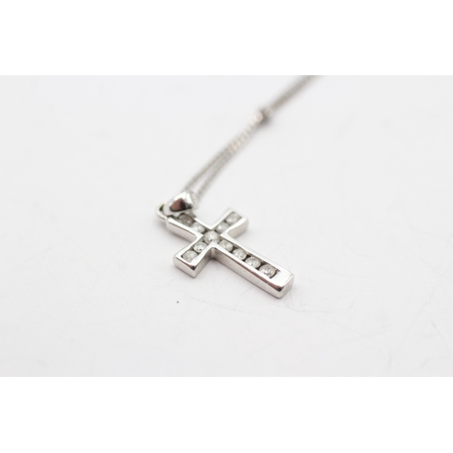 41 - 9ct white gold diamond cross pendant necklace (1.6g)