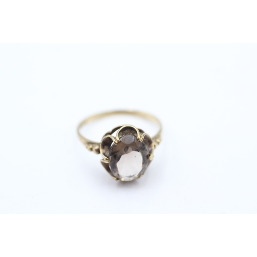 53 - 9ct gold smokey quartz cocktail ring (2g) Size M