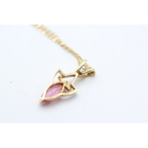 55 - 18ct gold marquise cut enhanced padparadscha sapphire pendant with a 9ct gold curb link chain (3.1g)