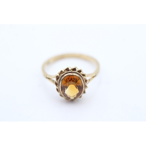 58 - 9ct gold citrine dress ring (2.4g) Size P