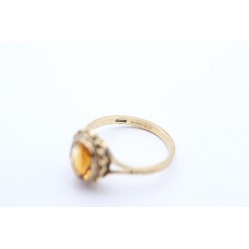 58 - 9ct gold citrine dress ring (2.4g) Size P