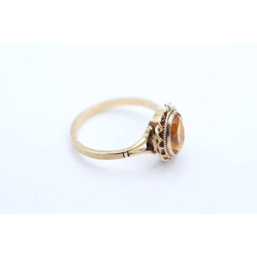 58 - 9ct gold citrine dress ring (2.4g) Size P