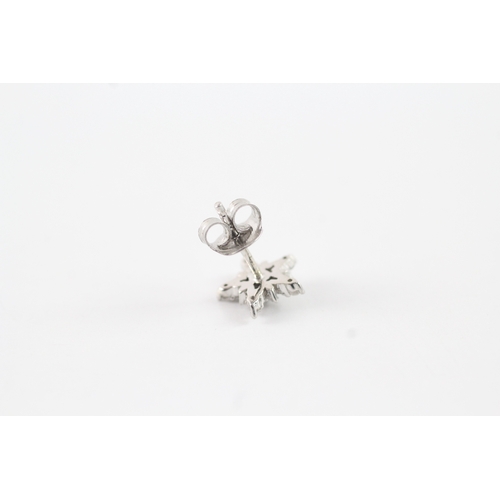 61 - 9ct white gold diamond starburst stud earrings (1.5g)