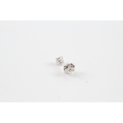 63 - 9ct gold diamond stud earrings (0.4g)