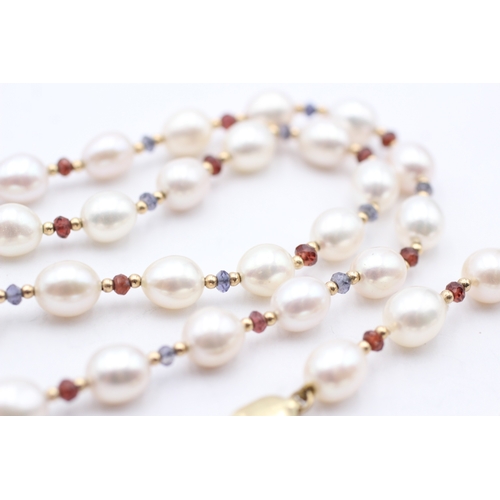 8 - 9ct gold cultured pearl, ruby & sapphire necklace (37g)