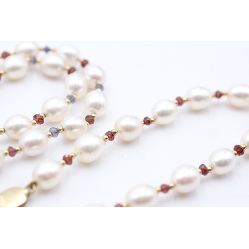 8 - 9ct gold cultured pearl, ruby & sapphire necklace (37g)