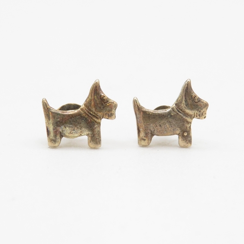 62 - 9ct gold dog stud earrings (1g)