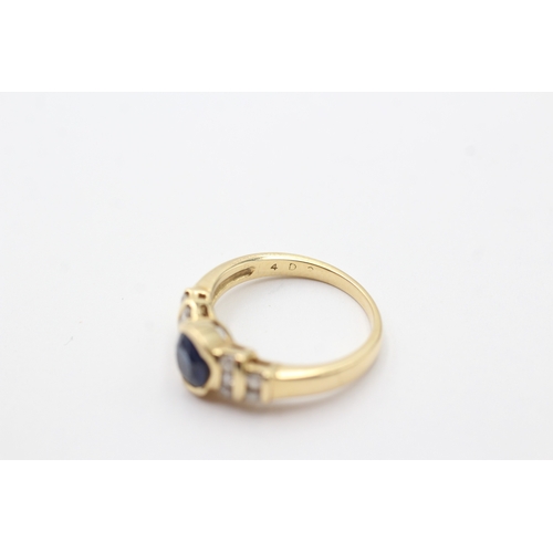 108 - 18ct gold sapphire & diamond dress ring (3.8g) Size K