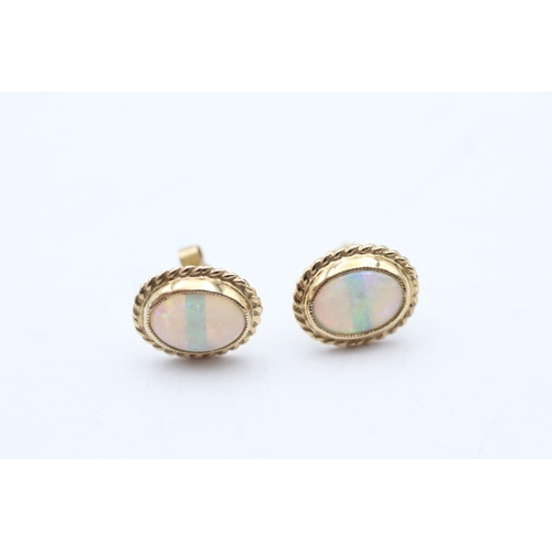 123 - 9ct gold opal stud earrings (1.4g)