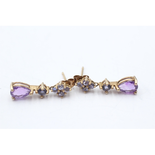 127 - 9ct gold tanzanite & amethyst drop earrings (1.8g)