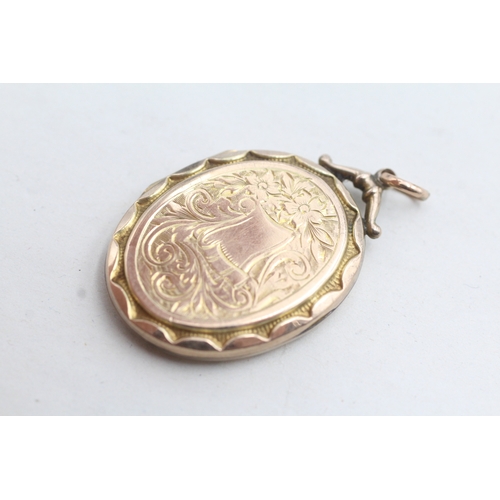 131 - 9ct gold back & front floral embossed locket (5.1g)