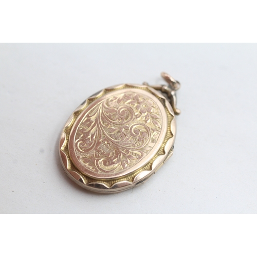 131 - 9ct gold back & front floral embossed locket (5.1g)