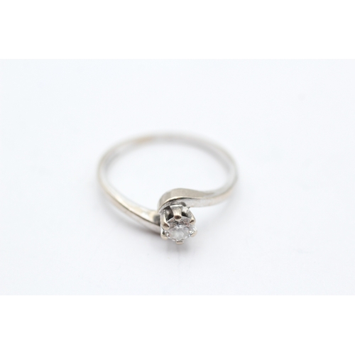 137 - 18ct gold diamond solitaire ring (2.6g) Size M