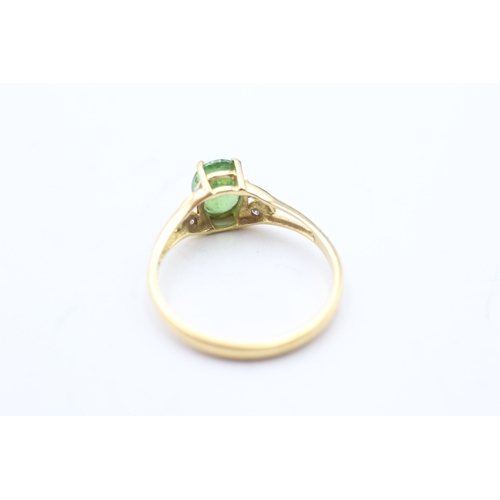 148 - 18ct gold diamond and green gemstone dress ring (3g) Size S 1/2