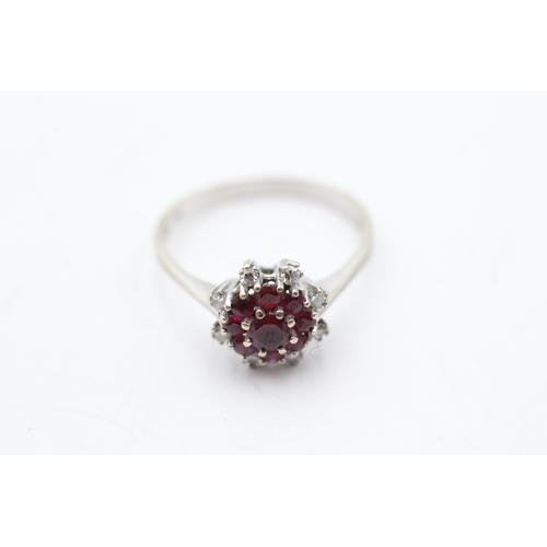 151 - 18ct gold ruby & diamond cluster ring (3.6g) Size R 1/2