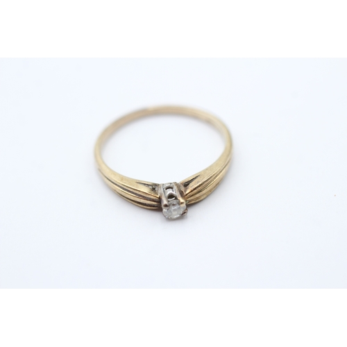 158 - 9ct gold diamond solitaire ring (1.6g) Size M