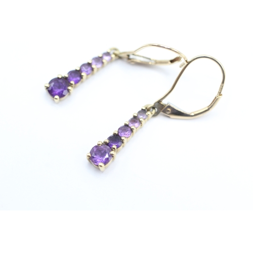 160 - 9ct gold graduated amethyst drop earrings (1.5g)