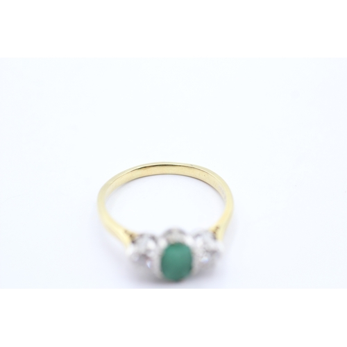 161 - 18ct gold diamond and emerald set trilogy ring (3.7g) Size R