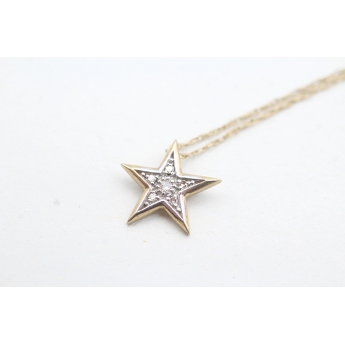 163 - 9ct gold diamond star pendant necklace (1.5g)