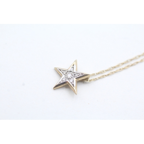 163 - 9ct gold diamond star pendant necklace (1.5g)