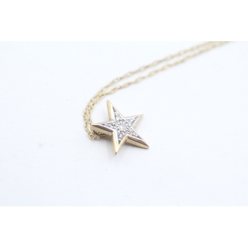 163 - 9ct gold diamond star pendant necklace (1.5g)