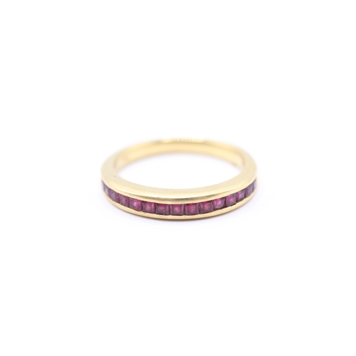 166 - 18ct gold ruby half eternity ring (4g) Size N