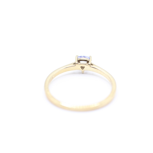 180 - 9ct gold trillion cut tanzanite solitaire ring (1.4g) Size N 1/2